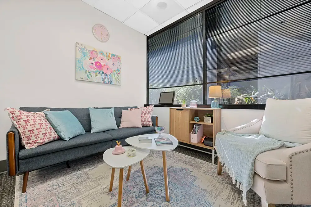 Lounge with soft seating at the women's program on Faraday Avenue