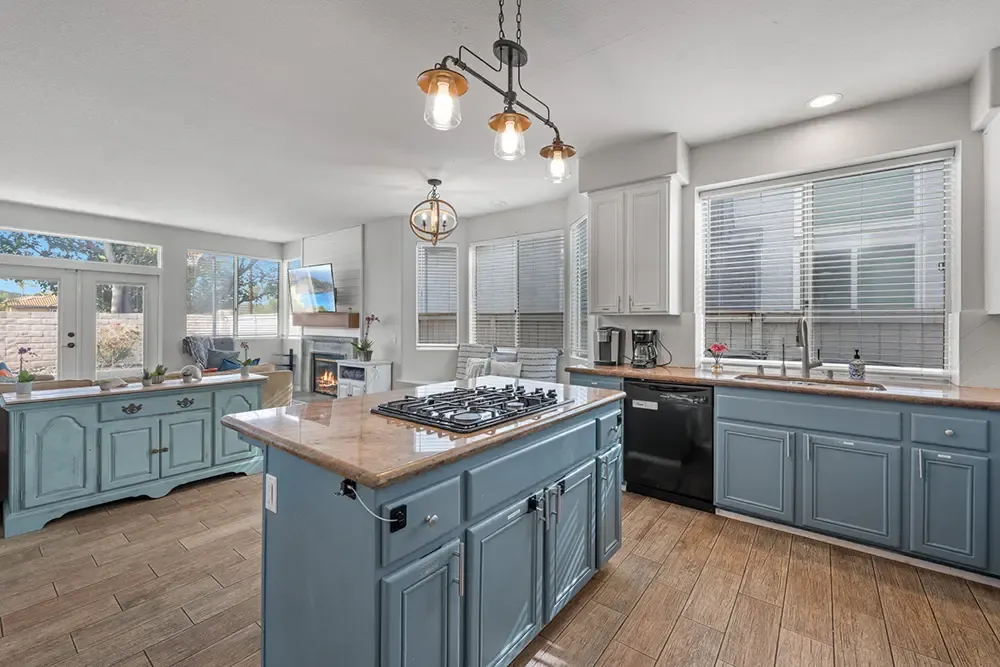 Kitchen with an island in a Wings residential home